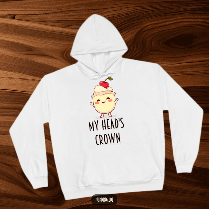 Funny pudding hoodie showing a wobbling pudding cup balancing a cherry, combining warmth with humorous dessert art.