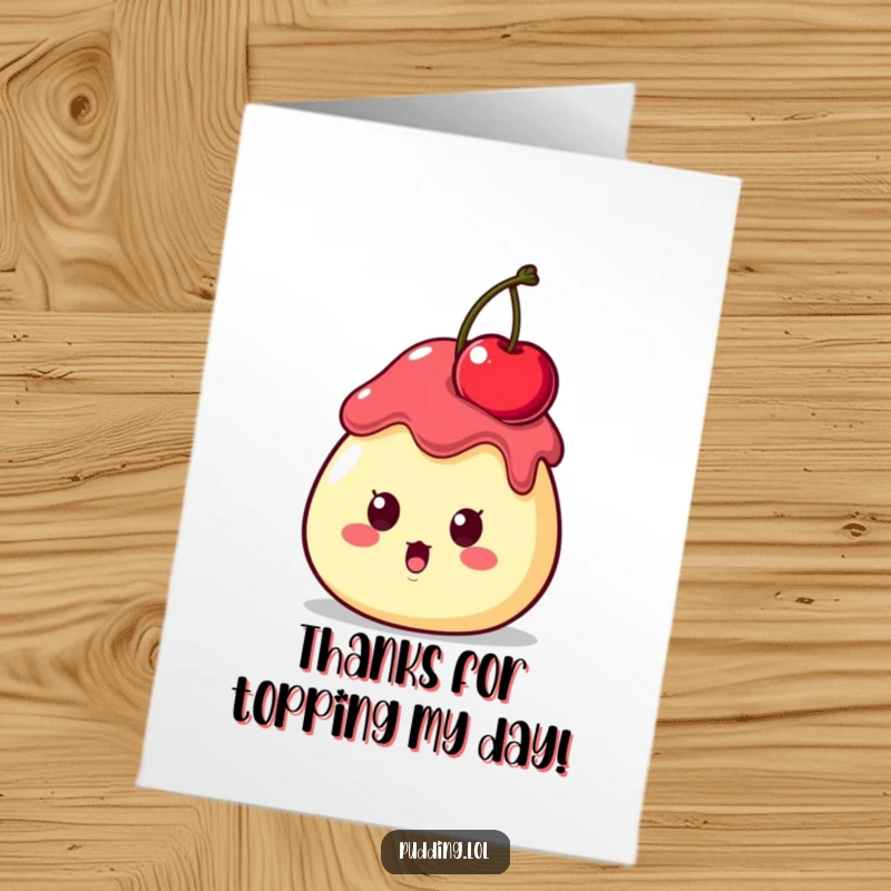 Funny Free Printable Thank You Card: A surprised pudding character sports a cherry perched precariously on its head, expressing thanks.
